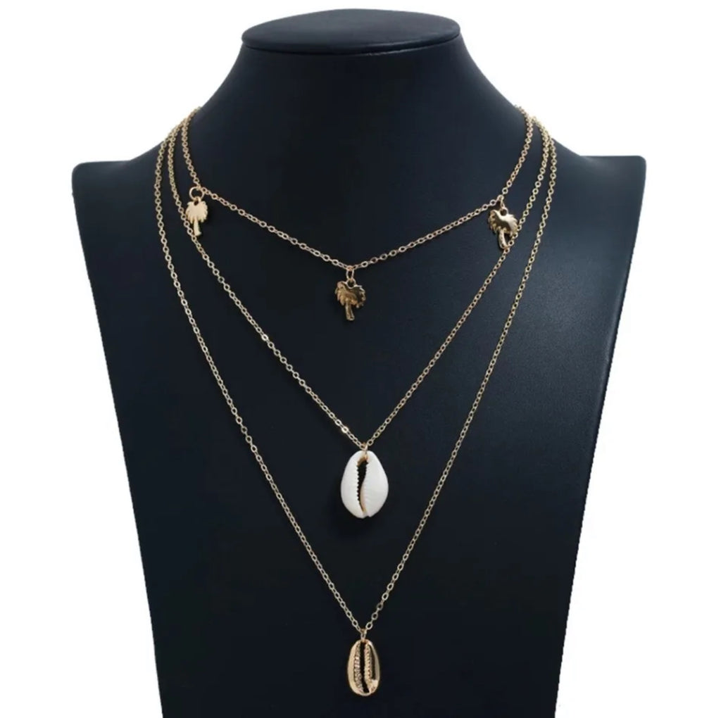 Collier multi-rang coquillage et palmier – Élégance naturelle