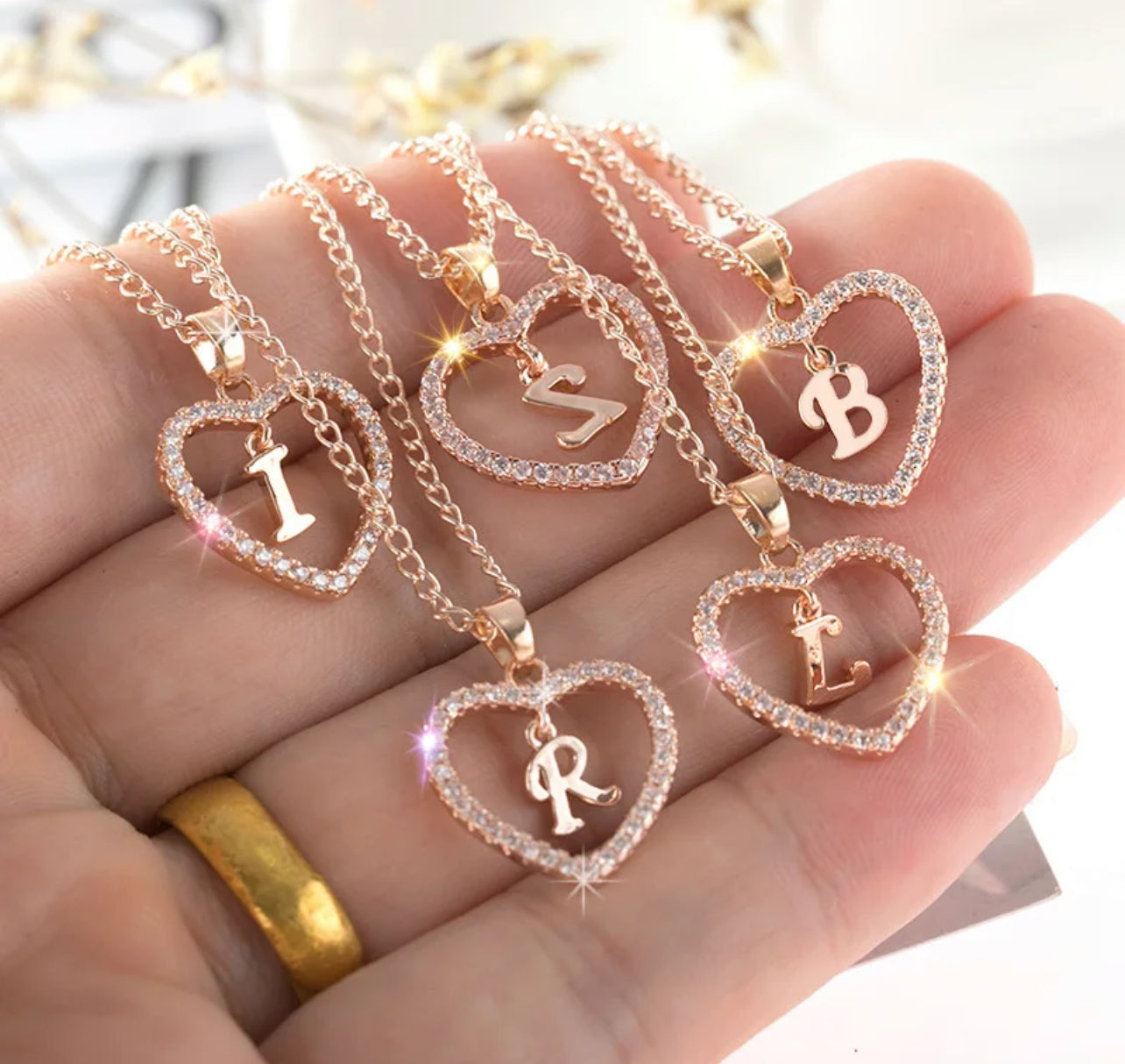 Collier pendentif cœur lettre or rose