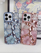 Coque iPhone "Floral Chrome" – Design 3D Luxueux & Reflets Métallisés