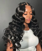 Perruque cheveux humains 200% 13*4 lace transparente frontale loose wave longueur 22 pouces