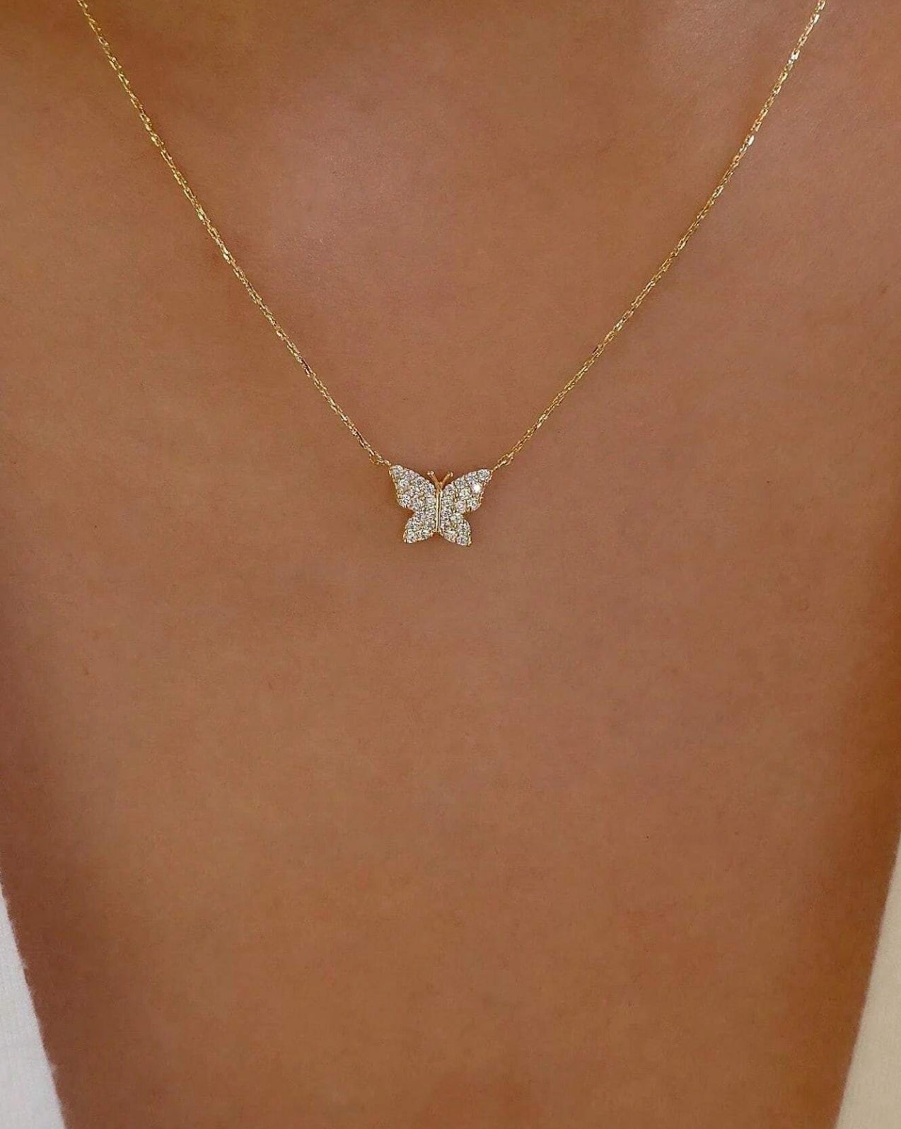 Collier mini papillon