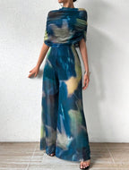 Élégance Fluide – Combinaison Tie-Dye Épaule Dénudée