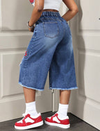 Vue arrière jean bermuda femme en denim bleu coupe large