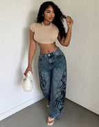 Jean wide leg femme délavé bleu à imprimé tribal - vue de face