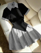 Robe polo plissée noire à rayures