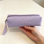 Trousse scolaire à étoiles lilas avec dragonne tressée